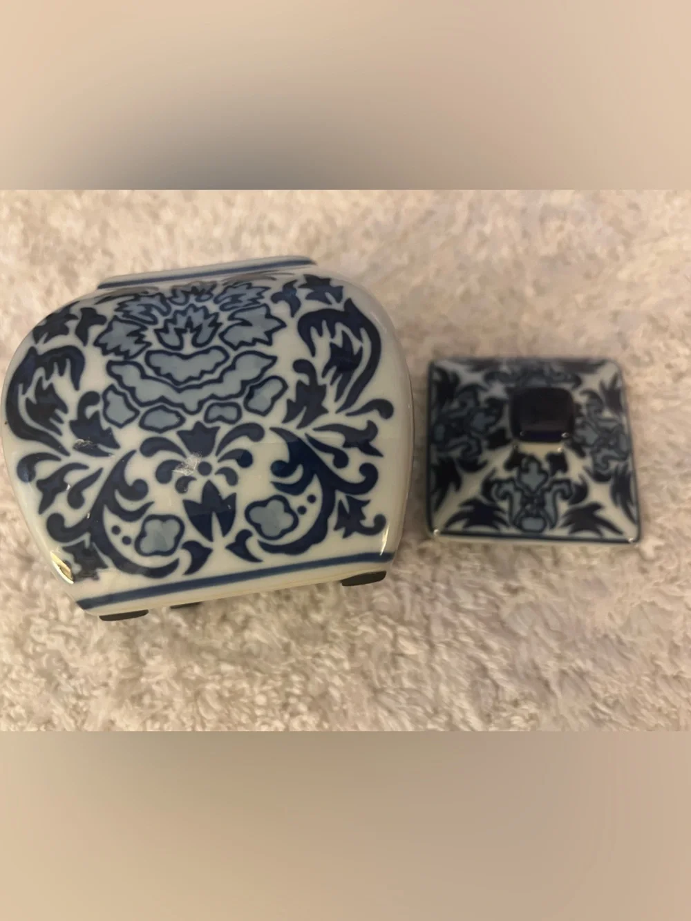 Vintage porcelain lidded blue and white floral jar
